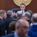 Republican Lt. Gov. Kevin Meyer, seated at the Speaker of the House chair, and Democratic legislators argue over what he can do on the first day of the 31st session of the Alaska Legislature on Tuesday, Jan. 15, 2019. (Michael Penn | Juneau Empire)