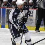 Soldotnas Wyatt Medcoff works the puck down the ice Tuesday night against Homer at the Soldotna Regional Sports Complex. (Photo by Joey Klecka/Peninsula Clarion)