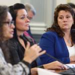 Corri Feige, Commissioner of the Department of Natural Resources, right, listens to Chantal Walsh, director of the Division of Oil and Gas, left, as along with Sara Longan, Deputy Commissioner of DNR, center, give a status of North Slope production during a Senate Finance Committee meeting on Thursday, Jan. 17, 2019. (Michael Penn | Juneau Empire)