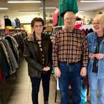 From left, board members Jackie Swanson and Alex Zerbinos and manager Jean Warrick pose at Bishops Attic in Soldotna on Friday. The thrift shop has seen an increase in donations and uses the items to give back to the community. (Photo by Victoria Petersen/Peninsula Clarion)
