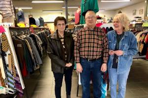 From left, board members Jackie Swanson and Alex Zerbinos and manager Jean Warrick pose at Bishops Attic in Soldotna on Friday. The thrift shop has seen an increase in donations and uses the items to give back to the community. (Photo by Victoria Petersen/Peninsula Clarion)
