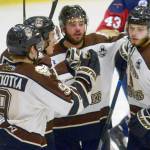 Trey LaBarge (far right) celebrates his first-period goal against the Topeka (Kansas) Pilots with teammates Friday, Feb. 1, 2019, at the Soldotna Regional Sports Complex. (Photo by Jeff Helminiak/Peninsula Clarion)