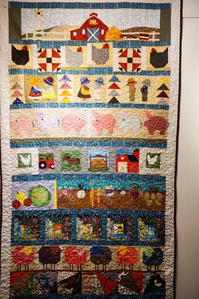 Karol Millers Down on the Farm quilt, one of the works in the 9 Women / 9 Quilts show that opened last Friday, Feb. 1, 2019, at the Homer Council on the Arts, in Homer, Alaska. (Photo by Michael Armstrong/Homer News)