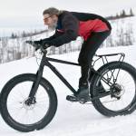 Brian Marang sails down a hill during Fat Freddies Bike Race and Ramble on Saturday, Feb. 9, 2019, in the Caribou Hills near Freddies Roadhouse. (Photo by Jeff Helminiak/Peninsula Clarion)