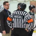 Kenai River Brown Bears head coach Josh Petrich has a discussion with a referee at the Soldotna Regional Sports Complex on Friday, Jan. 11, 2019. (Photo by Jeff Helminiak/Peninsula Clarion)