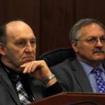 Rep. Gary Knopp, R-Kenai, and Rep. Dave Talerico, R-Healy, sit next to each other after Knopp voted not to confirm Talerico as Speaker of the House on Tuesday. (Alex McCarthy | Juneau Empire)