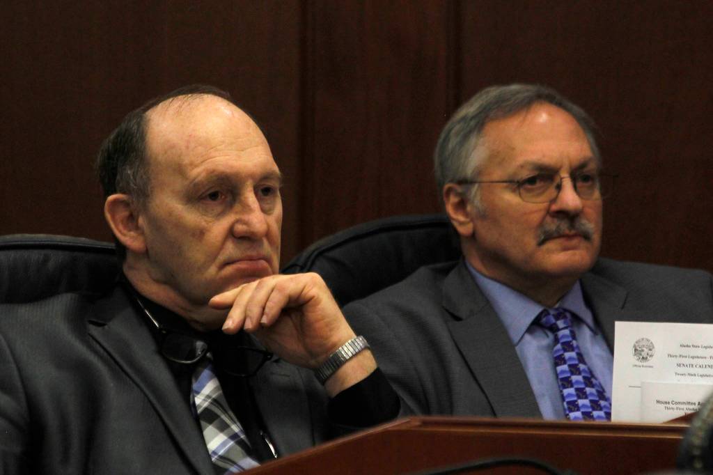 Rep. Gary Knopp, R-Kenai, and Rep. Dave Talerico, R-Healy, sit next to each other after Knopp voted not to confirm Talerico as Speaker of the House on Tuesday. (Alex McCarthy | Juneau Empire)