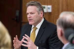 Gov. Mike Dunleavy speaks with his cabinet members at the Capitol on Tuesday, Jan. 8, 2019. (Michael Penn | Juneau Empire)