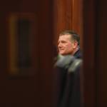 Rep. Chuck Kopp, R-Anchorage, watches after voting for Bryce Edgmon of Dillingham for Speaker of the House on Thursday, Feb. 14, 2019. (Michael Penn | Juneau Empire)