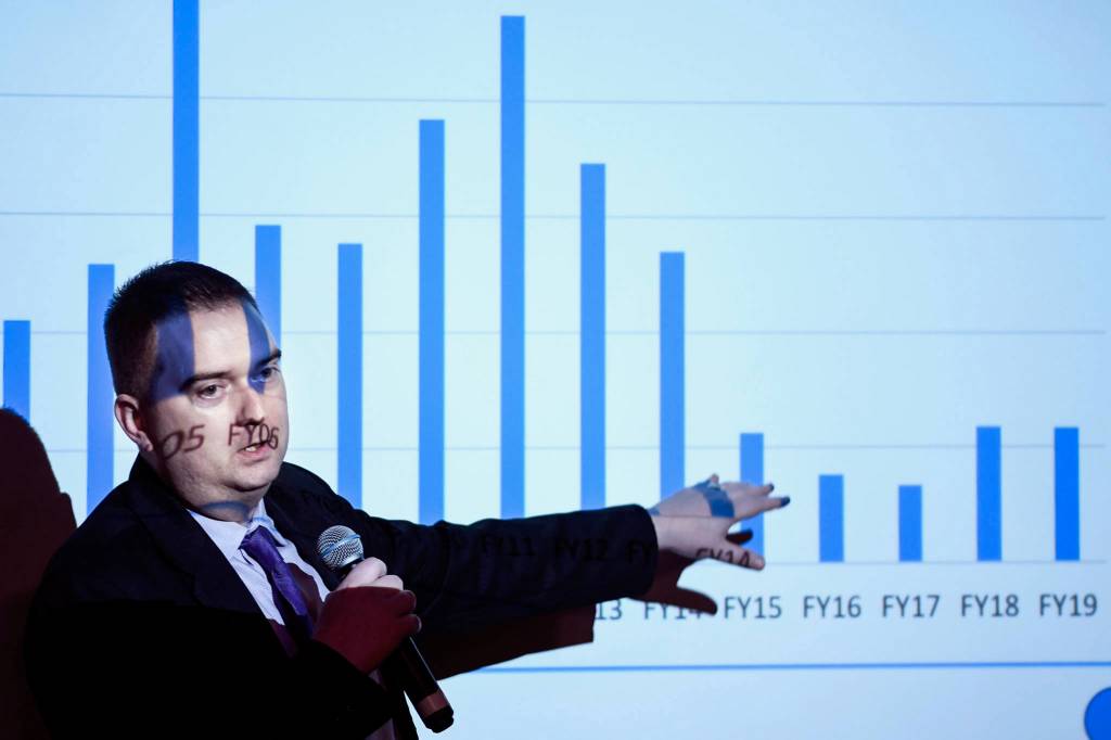 Edward King, Chief Economist for the Office of Management and Budget, speaks about the states revenue forecast to the Juneau Chamber of Commerce during its weekly luncheon at the Hangar Ballroom on Thursday, Feb. 7, 2019. (Michael Penn | Juneau Empire)