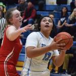 Soldotnas Ituau Tuisaula (13) looks at the rim against Wasillas Bella Hays Friday night in a conference meeting at Soldotna High School. (Photo by Joey Klecka/Peninsula Clarion)