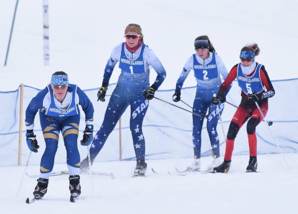 Homers Katia Holmes (left) leads the group of first-leg skiers Saturday afternoon at the Kenai Peninsula Borough nordic ski meet at the Tsalteshi Trails in Soldotna. (Photo by Joey Klecka/Peninsula Clarion)