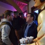 An aide, left, of Rep. Gary Knopp, R- Soldotna and a representative from Alaska Right to Life, right, confront each other during a town hall at the Kenai River Suites in Soldotna on Feb. 15, 2019. (Photo by Brian Mazurek/Peninsula Clarion)
