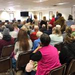 Residents pack into the Kenai Peninsula Borough Betty J. Glick Assembly Chambers for a chance to hear and speak with R-Sen. Peter Micciche (Kenai/Soldotna) and R-Rep. Ben Carpenter (Nikiski) at a town hall meeting, Saturday, Feb. 23, 2019, in Soldotna, Alaska. (Photo by Victoria Petersen/Peninsula Clarion)