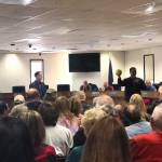 Residents pack into the Kenai Peninsula Borough Betty J. Glick Assembly Chambers for a chance to hear and speak with R-Sen. Peter Micciche (Kenai/Soldotna) and R-Rep. Ben Carpenter (Nikiski) at a town hall meeting, Saturday, Feb. 23, 2019, in Soldotna, Alaska. (Photo by Victoria Petersen/Peninsula Clarion)