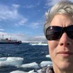 Kristin Mitchell takes a selfie with the MV Ushuaia in the background at Paulette Island on the Antarctic Peninsula on Jan. 4, 2019. (Photo courtesy of Kristin Mitchell)