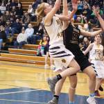 Homers Kelli Bishop takes a shot on the Grace Christian School basket during a Friday, Feb. 22, 2019 game in Homer, Alaska. Grace is one of three private school teams in Region 3A basketball. (Photo by Megan Pacer/Homer News)