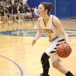 Homers Rylyn Todd dribbles the ball during a Friday, Feb. 22, 2019 game against Grace Christian School in Homer, Alaska. Todd was celebrated along with two other Lady Mariners for Senior Night. Grace is one of three private school teams in Region 3A basketball. (Photo by Megan Pacer/Homer News)