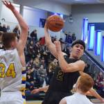 Ninilchiks Cole Hadro (2) whips the ball to a teammate Wednesday against Cook Inlet Academy at the 2019 Peninsula Conference championship tournament at Cook Inlet Academy in Soldotna. (Photo by Joey Klecka/Peninsula Clarion)