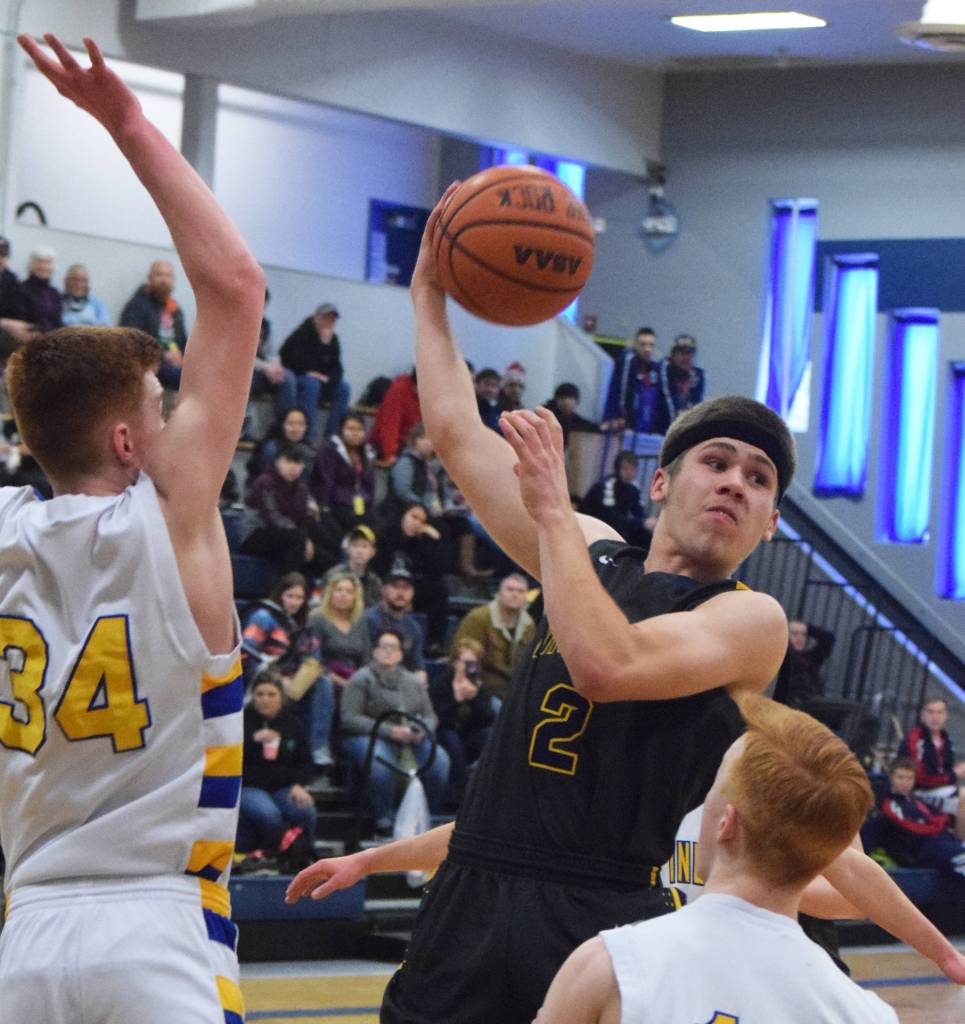 Ninilchiks Cole Hadro (2) whips the ball to a teammate Wednesday against Cook Inlet Academy at the 2019 Peninsula Conference championship tournament at Cook Inlet Academy in Soldotna. (Photo by Joey Klecka/Peninsula Clarion)