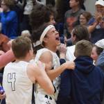 Soldotnas Mekhai Rich (middle) celebrates with teammates Friday night after a win over Wasilla in the Northern Lights Conference semifinals at Soldotna High School. (Photo by Joey Klecka/Peninsula Clarion)