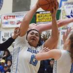 Soldotnas Ituau Tuisaula (13) grabs a rebound Friday night in the Northern Lights Conference semifinals against Palmer at Soldotna High School. (Photo by Joey Klecka/Peninsula Clarion)