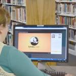 Kenai librarian Bethany McMilin demonstrates how to use Lynda.com, an online learning resource available for free through the public library system, at the Kenai Community Library on Wednesday. (Photo by Brian Mazurek/Peninsula Clarion)