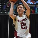 Nikolaevsks Justin Trail rises up for a jumpshot Wednesday against Sand Point at the Class 1A state basketball championships at the Alaska Airlines Center in Anchorage. (Photo by Joey Klecka/Peninsula Clarion)