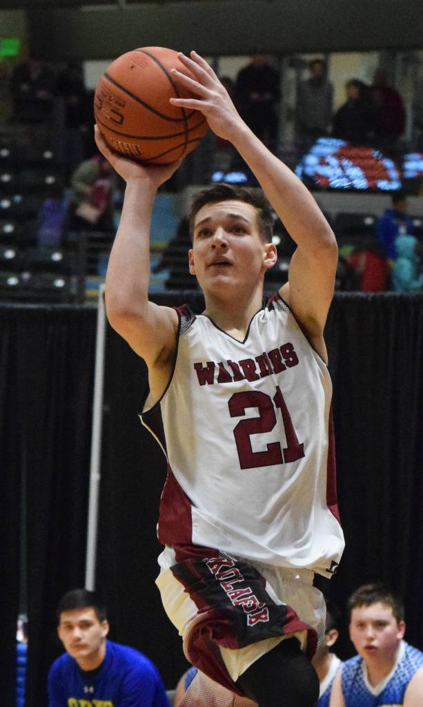 Nikolaevsks Justin Trail rises up for a jumpshot Wednesday against Sand Point at the Class 1A state basketball championships at the Alaska Airlines Center in Anchorage. (Photo by Joey Klecka/Peninsula Clarion)