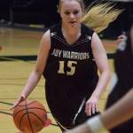 Nikolaevsks Markiana Yakunin looks for space Wednesday against Newhalen at the Class 1A state basketball championships at the Alaska Airlines Center in Anchorage. (Photo by Joey Klecka/Peninsula Clarion)