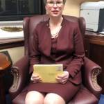 Rep. Sarah Vance, R-Homer, holds a batch of postcards from Homer High School students in this screenshot of a video she made for her Facebook page on the evening of March 7, 2019, from her office in Juneau. Vance later removed the video.