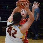 Kenais Liz Hanson guards Mt. Edgecumbes Maggie Miller (42) Thursday, Mar. 21, 2019, at the Class 3A state championship tournament at the Alaska Airlines Center in Anchorage. (Photo by Joey Klecka/Peninsula Clarion)