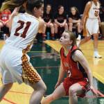 Kenais Hayley Maw (right) guards Mt. Edgecumbes Leticia Skaflestad Thursday, Mar. 21, 2019, at the Class 3A state championship tournament at the Alaska Airlines Center in Anchorage. (Photo by Joey Klecka/Peninsula Clarion)