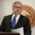 Bryan Schroder, Alaskas U.S. Attorney announces that several members of a white supremacist gang operating in Alaska prisons or shipped to facilities in Colorado and Arizona, have been charged in a racketing enterprise in Anchorage, Alaska, Wednesday, March 27, 2019. Members who sport Nazi tattoos face racketeering charges including murder, kidnapping, assault, and distribution of narcotics and firearms. (AP Photo/Mark Thiessen)