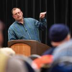 Ed Jones, of the Alaska Department Fish and Game, speaks at a King Salmon Symposium at Centennial Hall on Wednesday, March 27, 2019. The event was sponsored by the Territorial Sportsmen, Inc. (Michael Penn | Juneau Empire)