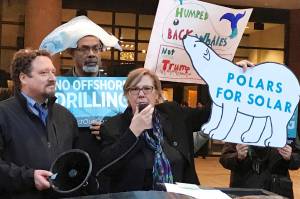 In this Feb. 15, 2018 file photo, Judith Enck, center, former regional administrator for the Environmental Protection Agency addresses those gathered at a protest against President Trumps plan to expand offshore drilling for oil and gas in Albany, N.Y. A U.S. judge in Alaska says President Donald Trump exceeded his authority when he reversed a ban on offshore drilling in vast parts of the Arctic Ocean and dozens of canyons in the Atlantic Ocean. Judge Sharon Gleason in a ruling late Friday, March 29, 2019 threw out Trump‚Äôs executive order that overturned the ban implemented by President Barack Obama.(AP Photo/David Klepper, File)