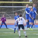 Soldotnas Austin Escott, Levi Rosin, Dylan Walton and Kaleb Swank stand in the wall against Homers Austin Shafford in front of Soldotna goalie Tyler Johnson on Tuesday at Soldotna High School in Soldotna. (Photo by Jeff Helminiak/Peninsula Clarion)