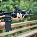 An AR-15 is held. (Lisa Marie Pane | Associated Press File)