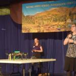 Seward High School students and second-place winners Lindy Guernsey and Akilena Veach present their drone project at the Caring for the Kenai contest at Kenai Central High School in Alaska on Thursday, April 18, 2019. (Photo by Brian Mazurek/Peninsula Clarion)