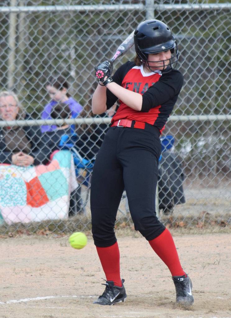 Kenai Centrals Kaidence Harvey takes a pitch from Soldotna Thursday, April 25, 2019, at the Soldotna Softball Fields. (Photo by Joey Klecka/Peninsula Clarion)