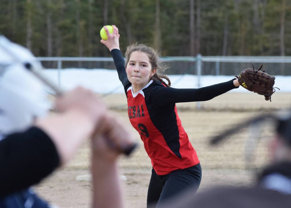 Kenai Centrals Lexi Reis unleashes a pitch on a Soldotna batter Thursday, April 25, 2019, at the Soldotna Softball Fields. (Photo by Joey Klecka/Peninsula Clarion)