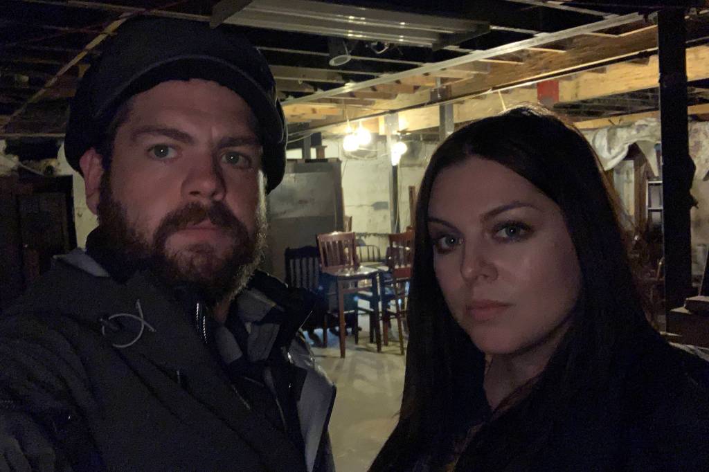 Jack Osbourne and Katrina Weidman prepare to investigate the basement of the Alaskan Hotel, which will be shown in an episode of the TV show Portals to Hell. (Courtesy Photo | Travel Channel)