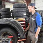 Alyeska Tire employee David Baldwin balances a tire at the location in Kenai, Alaska on May 2, 2019. (Photo by Brian Mazurek)