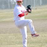 Kenai Central pitcher Harold Ochea delivers home Friday, May 3, 2019, at the Kenai Little League fields in Kenai, Alaska.
