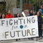 Students march from Juneau-Douglas High School: Yadaa.at Kalé to a climate change rally at the Alaska State Capitol, Friday, May 3, 2019. (Ben Hohenstatt | Juneau Empire)