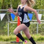 Soldotnas Brittany Taylor rounds a bend in the Class 4A girls 400-meter dash May 27, 2017, at the Alaska state track & field championships at Palmer High School. (Photo by Joey Klecka/Peninsula Clarion)