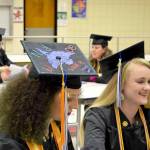 A group of nursing graduates from Kenai Peninsula Colleges Kenai River Campus get ready to walk the stage and receive their degrees on Thursday, May 9, 2019, at Kenai Central High School in Kenai, Alaska. (Photo by Victoria Petersen/Peninsula Clarion)