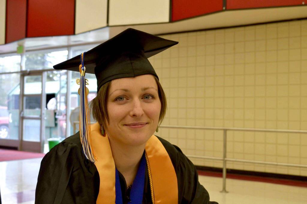 Kenai Peninsula Colleges Kenai River Campus graduate and valedictorian Arian Jasmin gets ready to walk the stage and receive her associates of arts degree on Thursday, May 9, 2019, at Kenai Central High School in Kenai, Alaska. (Photo by Victoria Petersen/Peninsula Clarion)