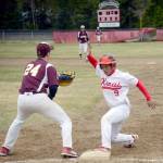 Kenai Centrals Harold Ochea gets back to first base before Grace Christian first baseman Steven Brown can apply the tag Friday, May 10, 2019, at the Kenai Little League fields in Kenai, Alaska. (Photo by Jeff Helminiak/Peninsula Clarion)