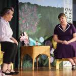 Donna Shirnberg (right) acts out a scene of Sabrina Fair with Terry Zopf-Schoessler during rehearsal Tuesday, May 14, 2019, at Triumvirate North Theater in Kenai, Alaska. (Photo by Joey Klecka/Peninsula Clarion)
